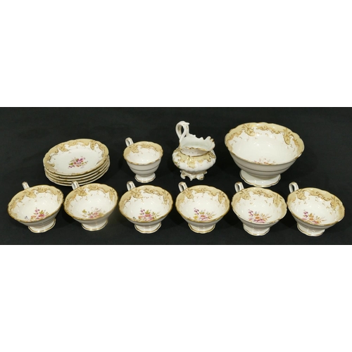 54 - A 19th Century part tea service on white and cream ground with multi-coloured floral leaf and gilt d... 