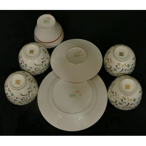 61 - A Shelley china trio on white, orange and grey ground, comprising of cup, saucer and side plate, 4 t... 