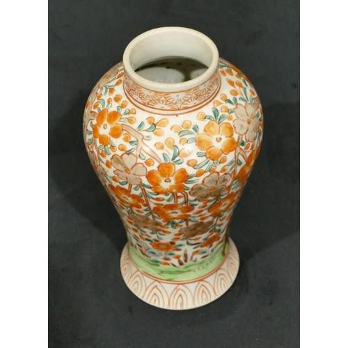 68 - An Oriental round bulbous thin necked vase on white ground with red, green tree, floral and gilt dec... 