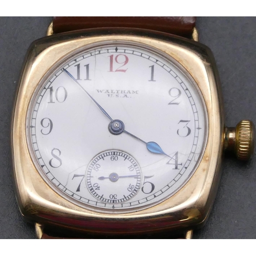 698 - A 9ct gold Waltham gentleman's wristwatch with white enamel dial (dial cracked) with seconds dial an... 