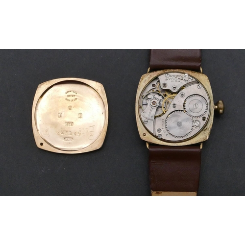 698 - A 9ct gold Waltham gentleman's wristwatch with white enamel dial (dial cracked) with seconds dial an... 