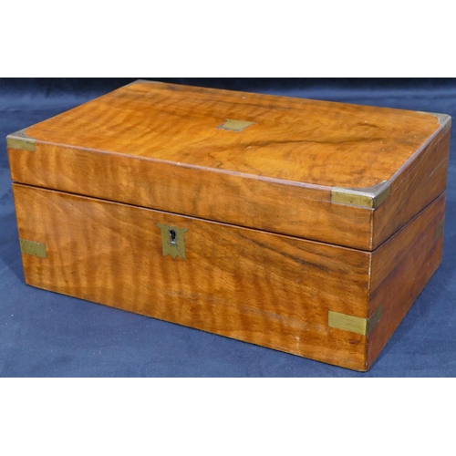 702 - A 19th Century walnut rectangular shaped writing box with brass mounts, hinged lid enclosing red lea... 