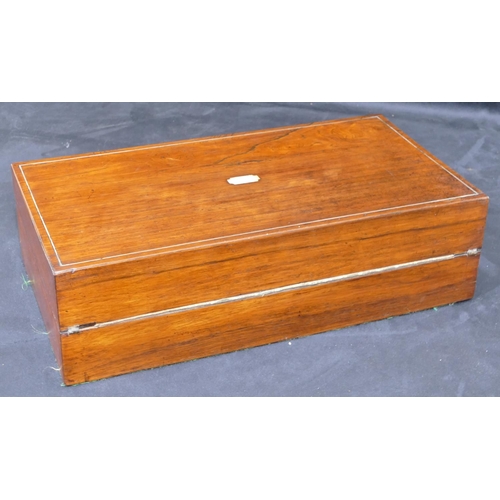 707 - A 19th Century rosewood rectangular shaped writing box with Mother of Pearl and metal stringing deco... 