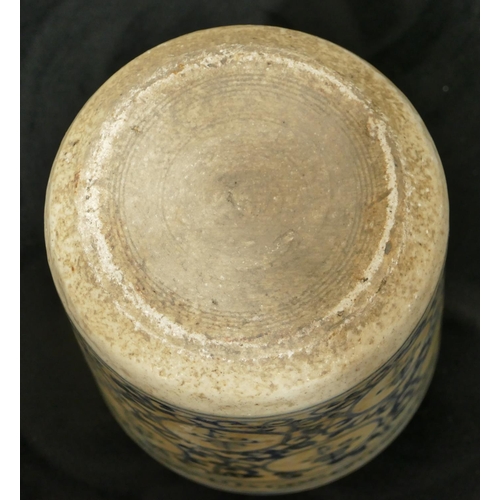 71 - An Oriental cylindrical brush pot on blue and white ground with inscription and scroll decoration, 1... 