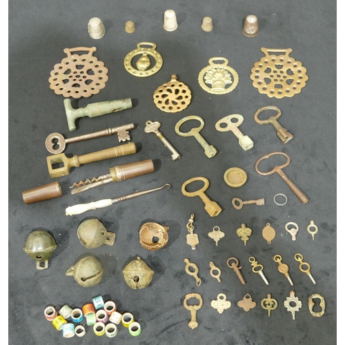 714 - 5 Crotal bells and a quantity of various bird rings, thimbles, keys etc.