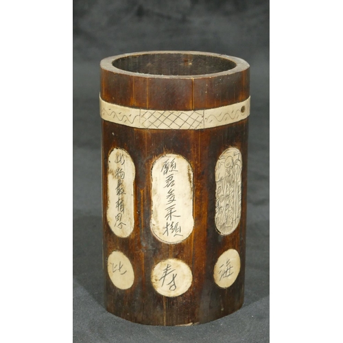 724 - An Oriental bamboo octagonal cylindrical shaped brush pot with figure and inscription decoration, 15... 