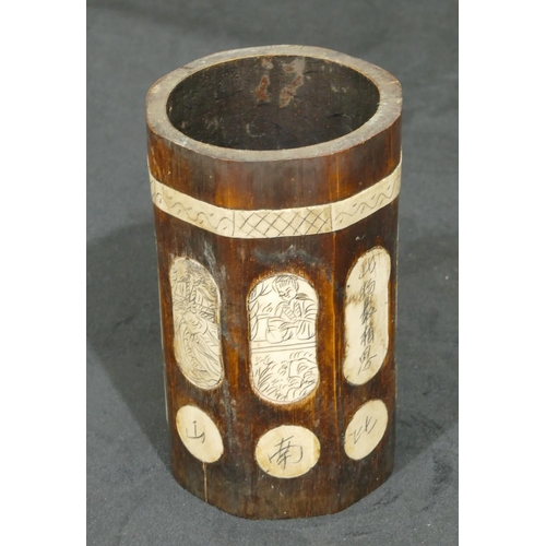 724 - An Oriental bamboo octagonal cylindrical shaped brush pot with figure and inscription decoration, 15... 