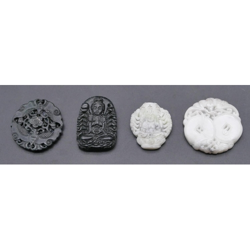 726 - An Oriental hardstone panel in the form of a seated Buddha, 4 other small panels (4)