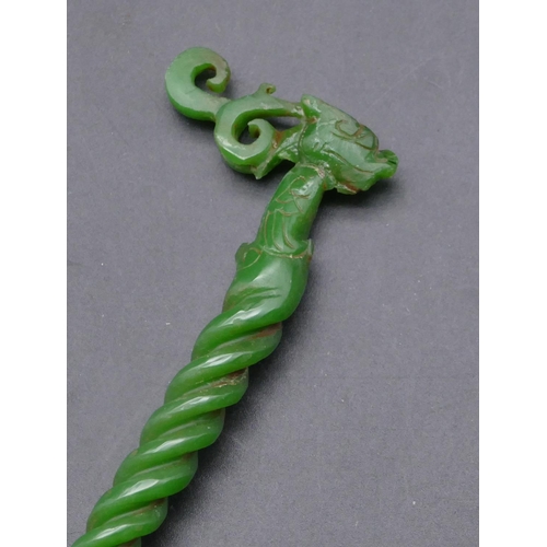 728 - An Oriental hardstone hairpin with bird's head mount with twisted stem (neck restored)