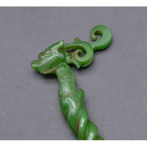 728 - An Oriental hardstone hairpin with bird's head mount with twisted stem (neck restored)