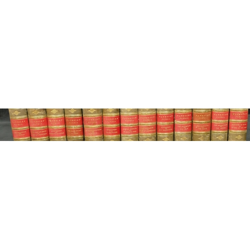 744 - A set of 13 leather bound books 