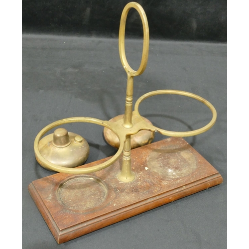 745 - Robertson & Co, Glasgow brass double bottle burner stand with centre carrying handle, 2 burners on m... 