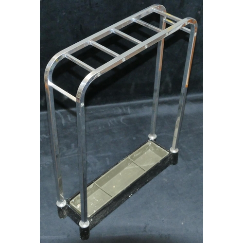 754 - An Art Deco chrome 4-sectioned umbrella stand with tray to base, 44cm wide, 13cm deep, 56cm high.