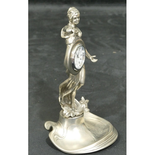 758 - A modern pewter Art Nouveau style figure of a standing lady holding timepiece on splayed base, 19cm ... 