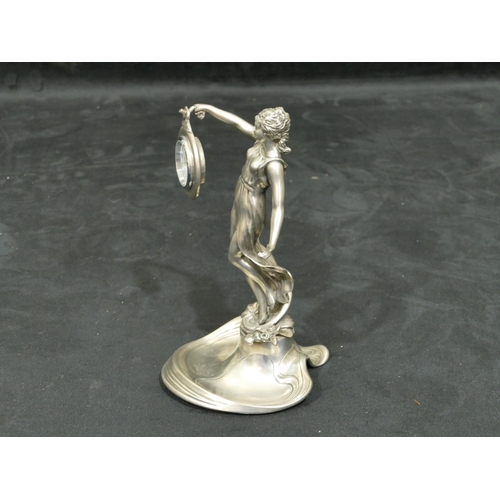 758 - A modern pewter Art Nouveau style figure of a standing lady holding timepiece on splayed base, 19cm ... 