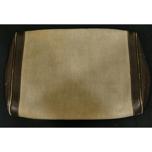 759 - A Hermes, Paris canvas and brown leather pouch bag, with Hermes stamp (some wear and stains), 29cm w... 