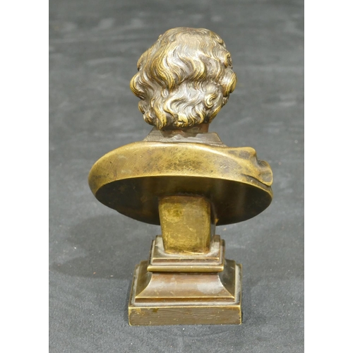 761 - A 19th Century bronze bust of Shakespeare on squared stand, numbered 30572, 14cm high.