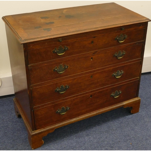 828 - A George III mahogany straight front chest of drawers with brush slide, 4 long graduated drawers bel... 