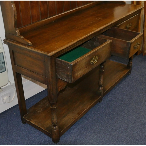 829 - A quality reproduction oak Welsh dresser with shelved back with single panelled door, 3 drawers belo... 