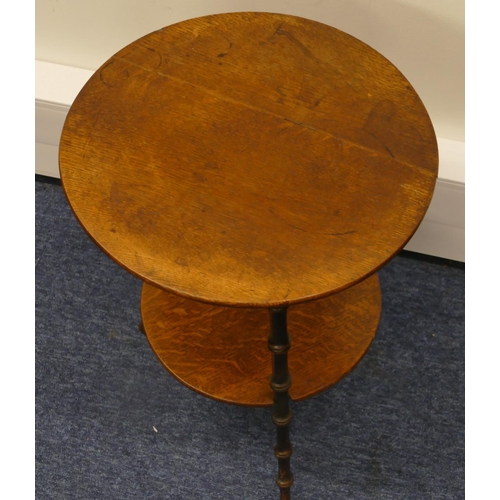 834 - An oak round gypsy table with turned legs, under tier, 38cm diameter, 54cm high (rickety)