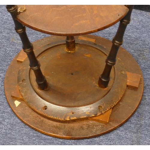 834 - An oak round gypsy table with turned legs, under tier, 38cm diameter, 54cm high (rickety)