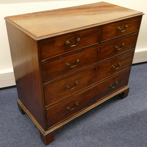 841 - A George III mahogany straight front chest of drawers with in part inlaid stringing, 2 short and 3 l... 