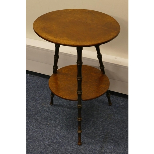 834 - An oak round gypsy table with turned legs, under tier, 38cm diameter, 54cm high (rickety)