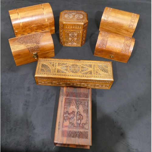 4088 - 7 carved wood and inlaid boxes with hinged lids. (7)