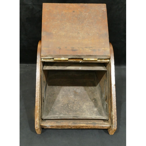 4104 - A Victorian oak coal scuttle with brass mounts.33cm high, 32.5cm wide, 50.5cm deep.