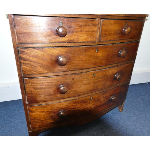 4106 - A George III mahogany bow fronted chest of drawers, with banded top, (3 pieces of veneer to top and ... 