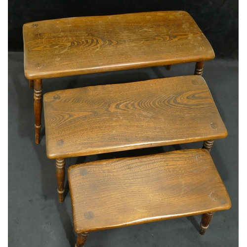 4110 - Nest of 3 Ercol style oak coffee tables, largest 65cm wide, 27cm deep, 33.5cm high. (3)