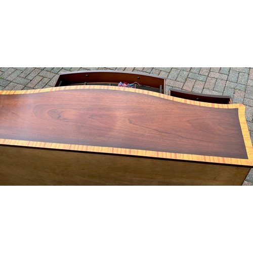 4144 - A good quality mahogany Serpentine fronted sideboard with banded top, centre drawer flanked by 2 sma... 