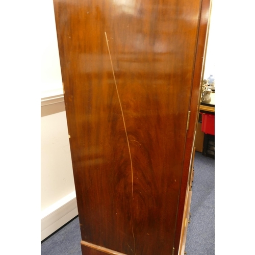 4107 - A good quality Edwardian mahogany double wardrobe, 2 double panel doors enclosing hanging, 2 drawers... 