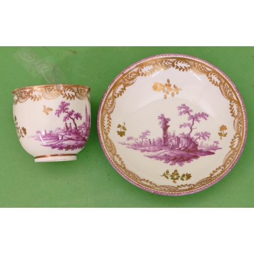 5010 - An 18th/19th Century Vienna Cup and Saucer on white ground having puce landscape building and gilt d... 