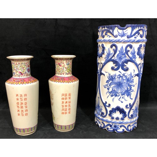 5039 - A pair of multi-coloured modern Oriental vases, 34cm high, (some chips to rims and 1 rim glued) and ... 