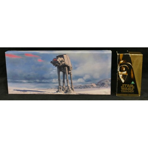 5041 - A Limited edition Star Wars print on canvas, 21 x 50cm and a boxed set of 3 Star Wars Trilogy Specia... 