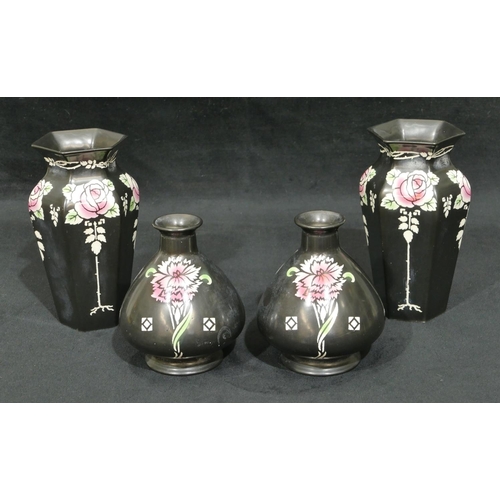 101 - A pair of Shelley hexagonal bulbous thin necked trumpet shaped vases on black ground with coloured  ... 