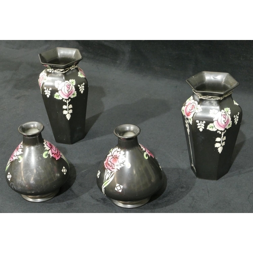 101 - A pair of Shelley hexagonal bulbous thin necked trumpet shaped vases on black ground with coloured  ... 