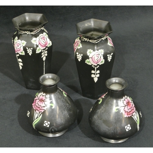 101 - A pair of Shelley hexagonal bulbous thin necked trumpet shaped vases on black ground with coloured  ... 