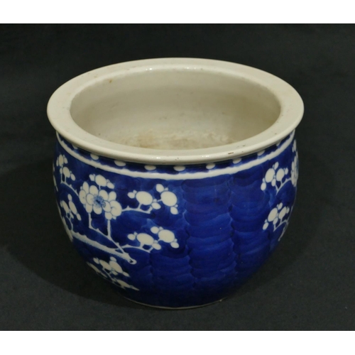 104 - A Chinese blue and white small round bulbous shaped jardiniere with branch and blossom decoration, 1... 