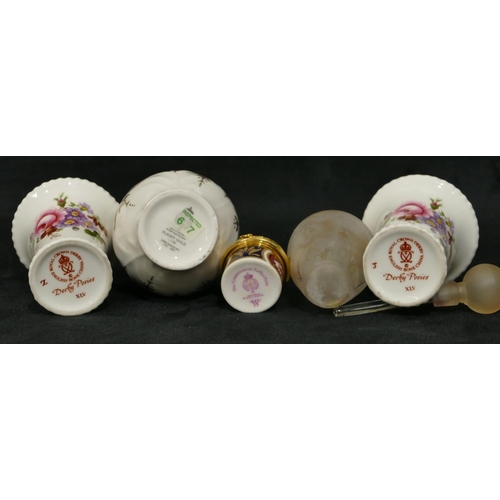 75 - A pair of Royal Crown Derby miniature round trumpet shaped vases 