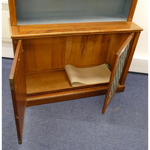 5090 - A 19th Century walnut bookcase with inlaid scroll motifs and banding, open shelved back above 2 gilt... 