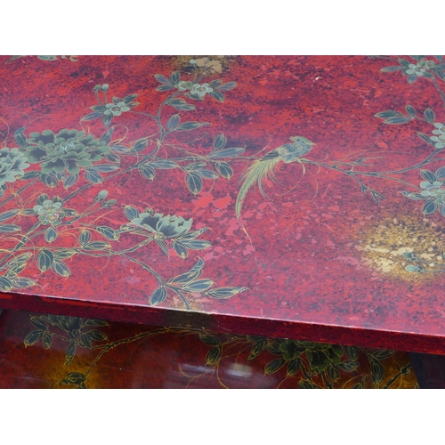 5091 - A modern Oriental red lacquered rectangular shaped coffee table with allover bird, floral, leaf and ... 