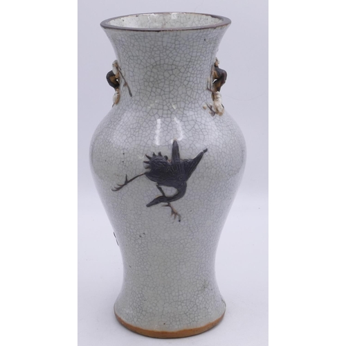 99 - A 19/20th Century Chinese round and bulbous thin necked trumpet shaped Crackleware vase with raised ... 