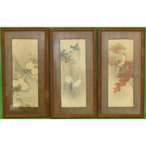 219 - 3 x Oriental watercolours depicting birds, tree and floral decoration, in oak frames, 29cm x 10.5cm.