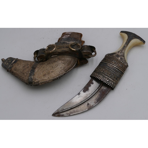 4050 - A Persian silver coloured metal and bone handled Arabian dagger with sheath (part coming away to she... 