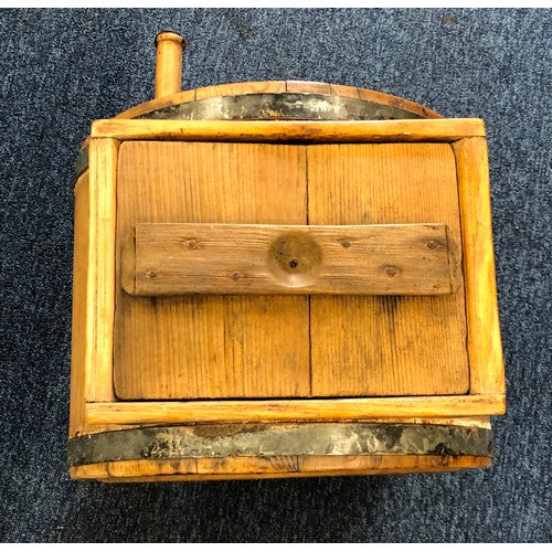 6073 - A wooden butter churner with turning handle etc, 44cm high.