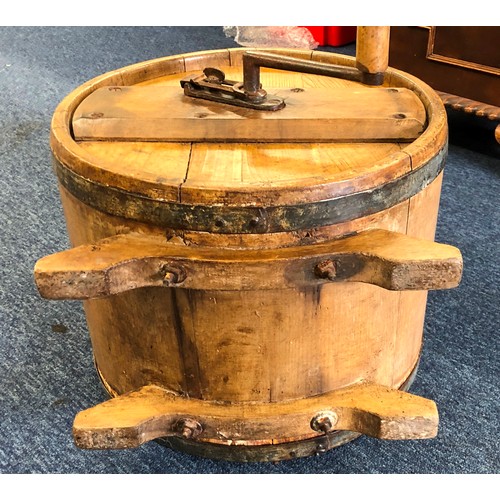 6073 - A wooden butter churner with turning handle etc, 44cm high.