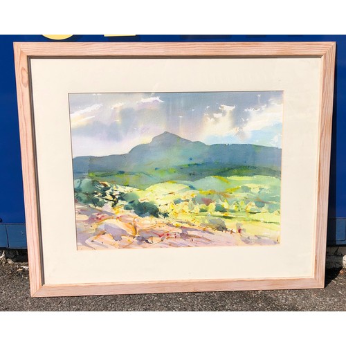 6094 - A watercolour landscape with hills in the background,60.5 x 44.5cm  in wood frame.