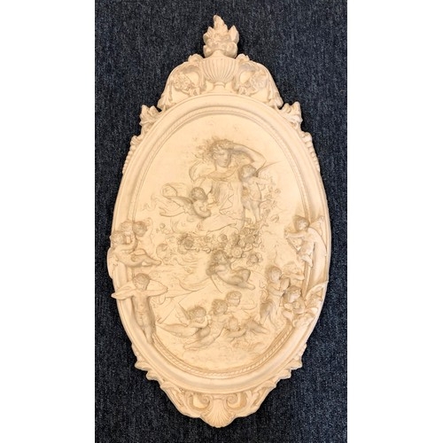 6109 - A composition plaster oval plaque of woman surrounded by cherubs, 71.5 x 36.5cm.